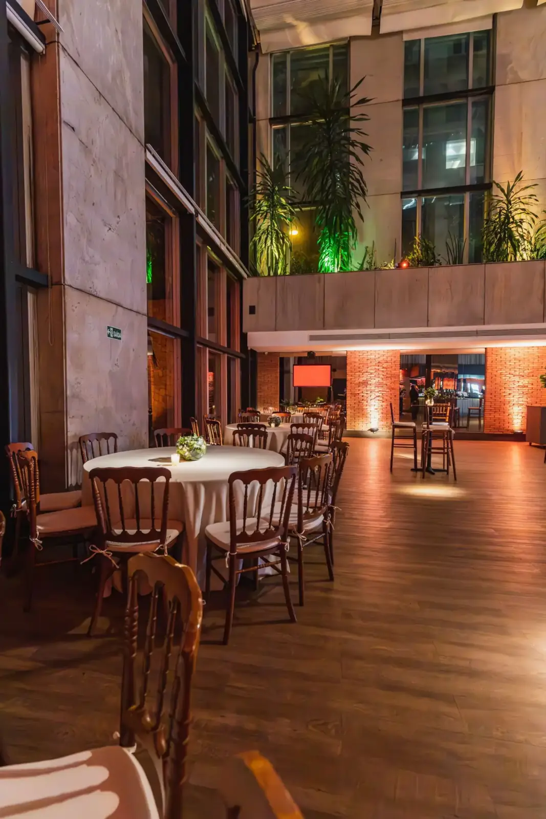 Event space set with round tables and chairs before guests arrive